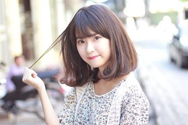 Tóc uốn ngang vai mái ngố - tóc uốn ngang vai cho mặt tròn