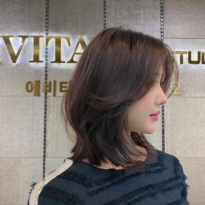 Tóc mullet hai mái uốn xoăn nhẹ